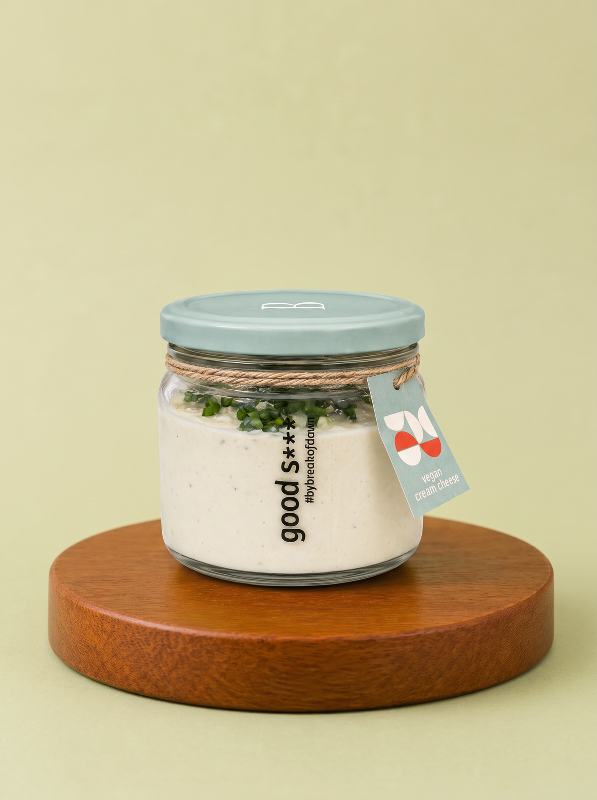 A jar of Break of Dawn thecha cream cheese, cashew-based vegan cream cheese with green chilli thecha